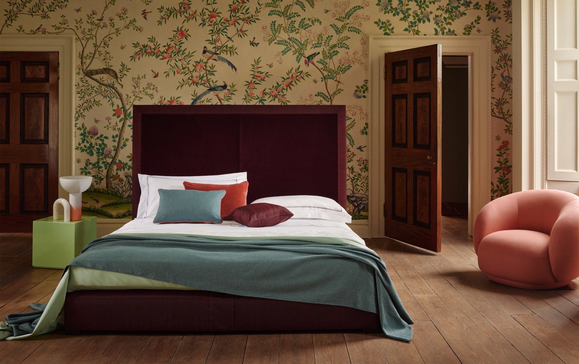 Max bed set completely dressed and photographed on a wooden floor