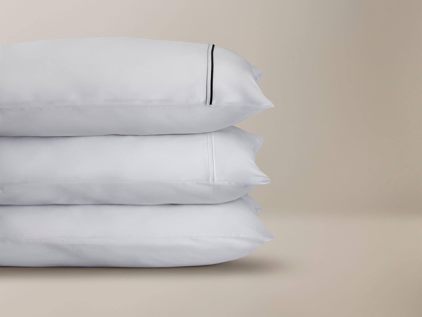 Stack of pillow cases with cording