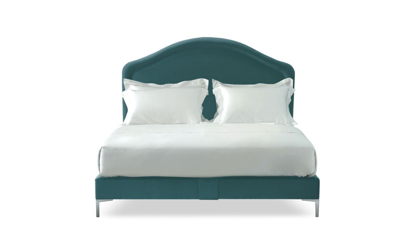 Undressed Cassie bed with a cobalt blue fabric on headboard and base, featuring cushions