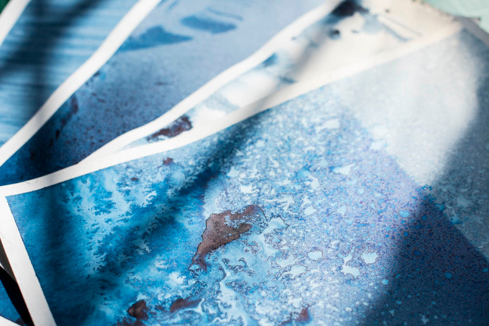A digital print with blue paint