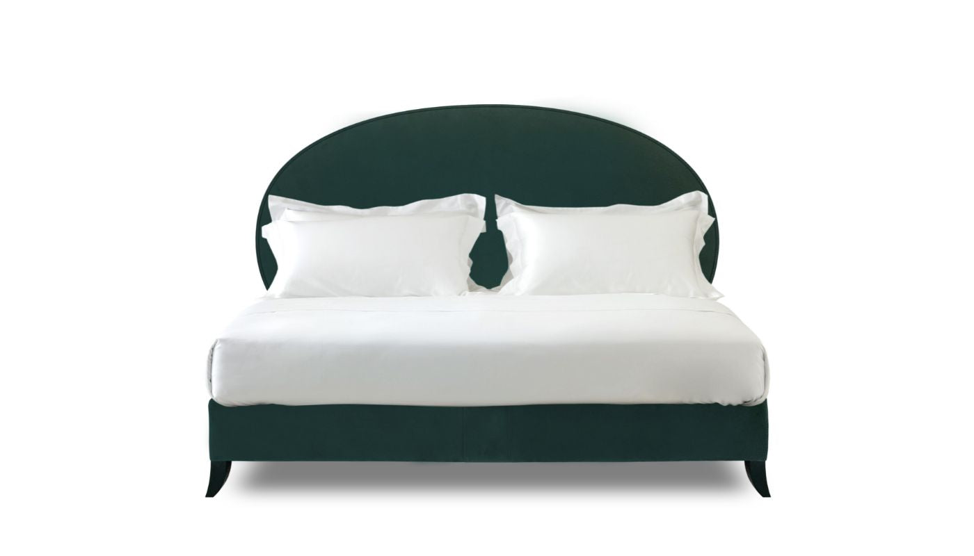 Undressed Elly bed with a dark green fabric on headboard and base, featuring cushions