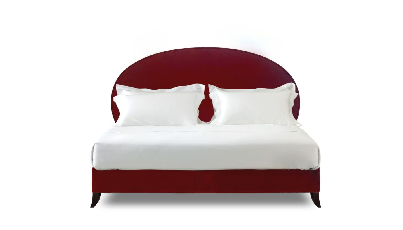 Undressed Elly bed with a red wine fabric on headboard and base, featuring cushions
