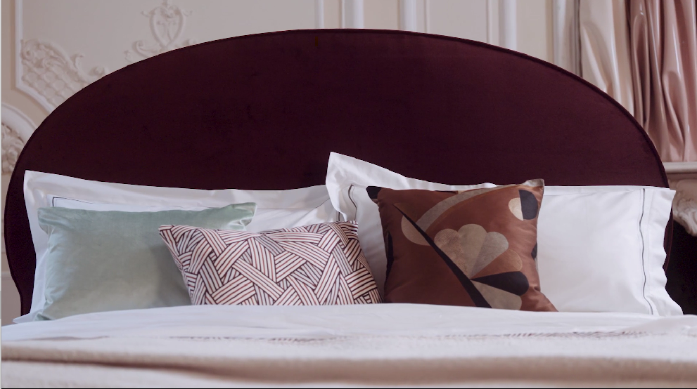 Close-up of the Elly headboard featuring different cushions