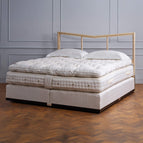 Savoir bed featuring the bed set no1 with the mattress, the topper and the base.