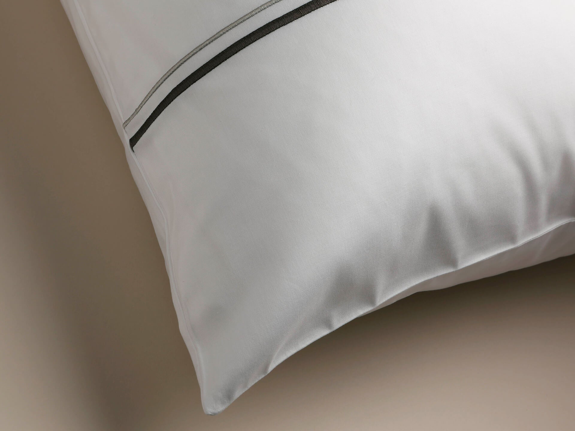 An angled view of a percale pillowcase