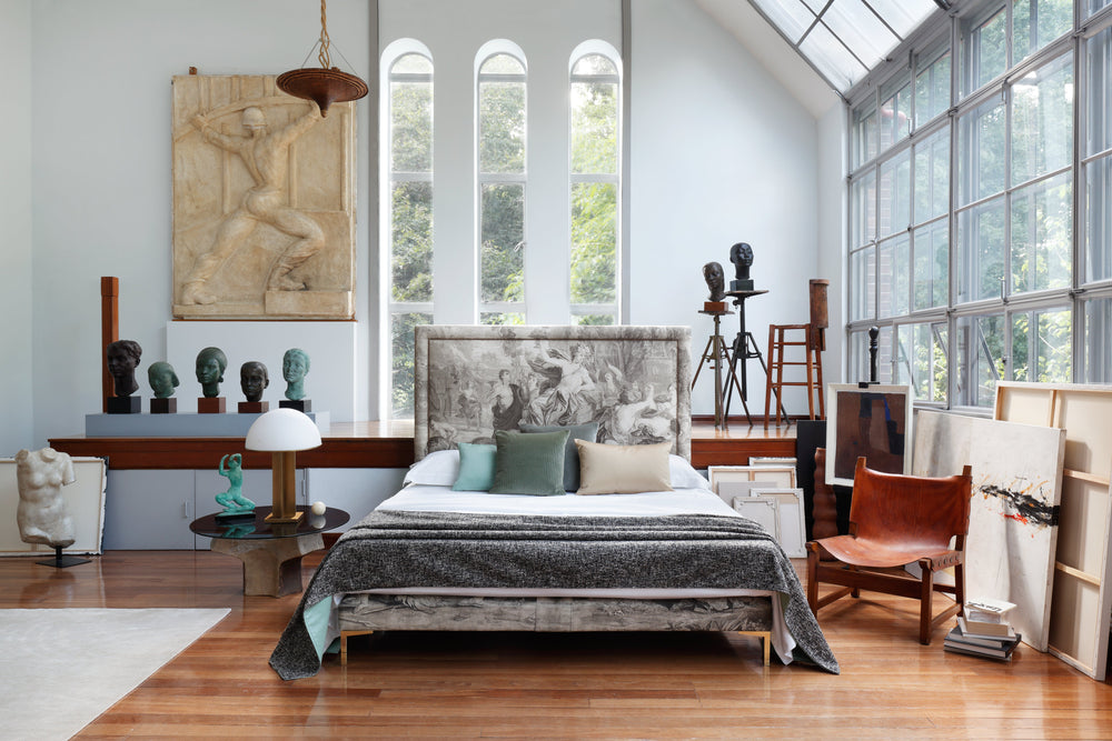 Savoir Felix bed in a room with large windows