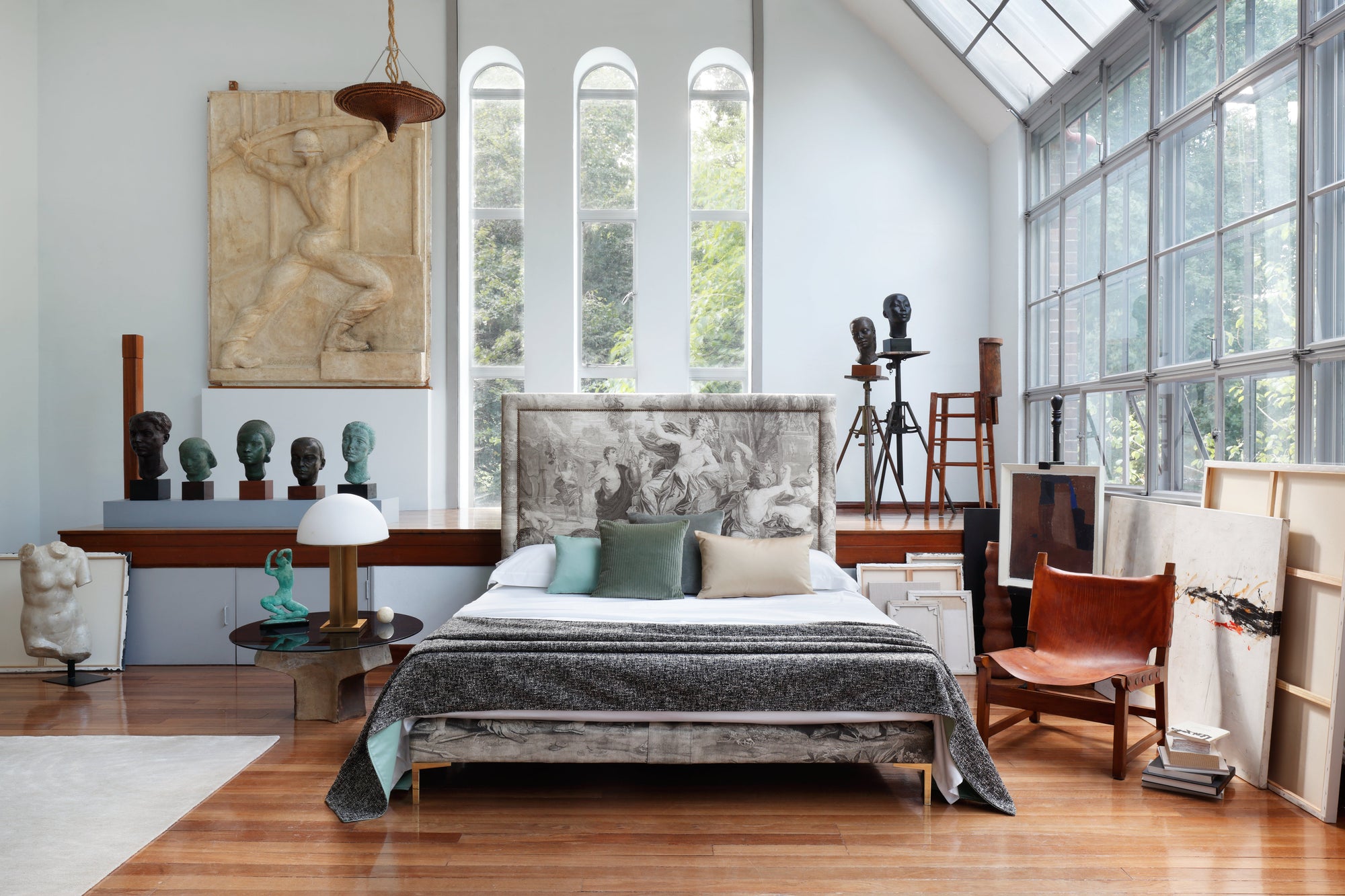 Savoir Felix bed in a room with large windows