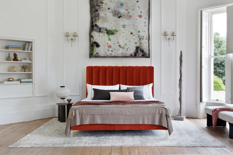 Savoir Hudson bed with a fluted headboard crafted with natural materials