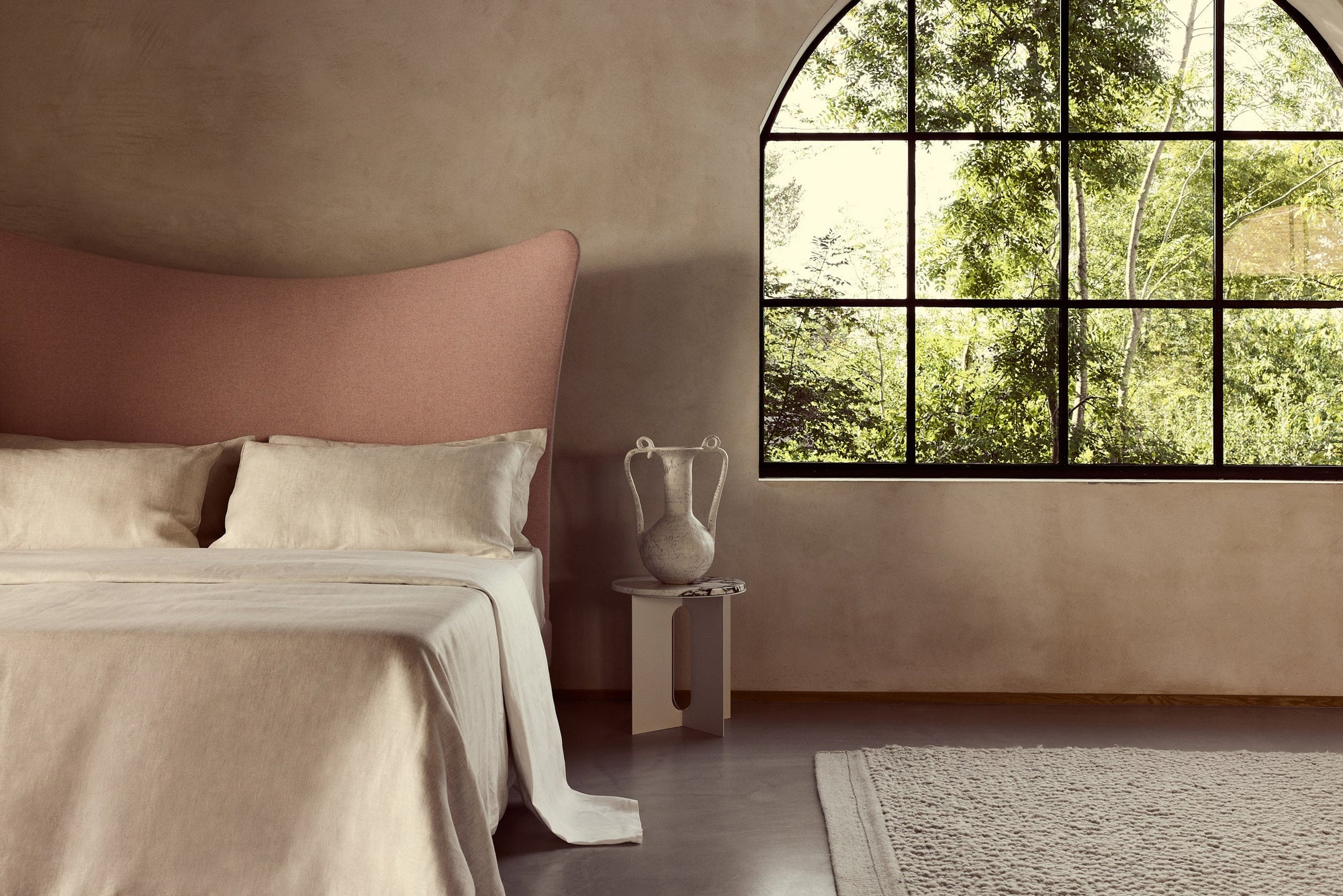 Amelia bed showcasing the savoir oatmeal Herringbone set