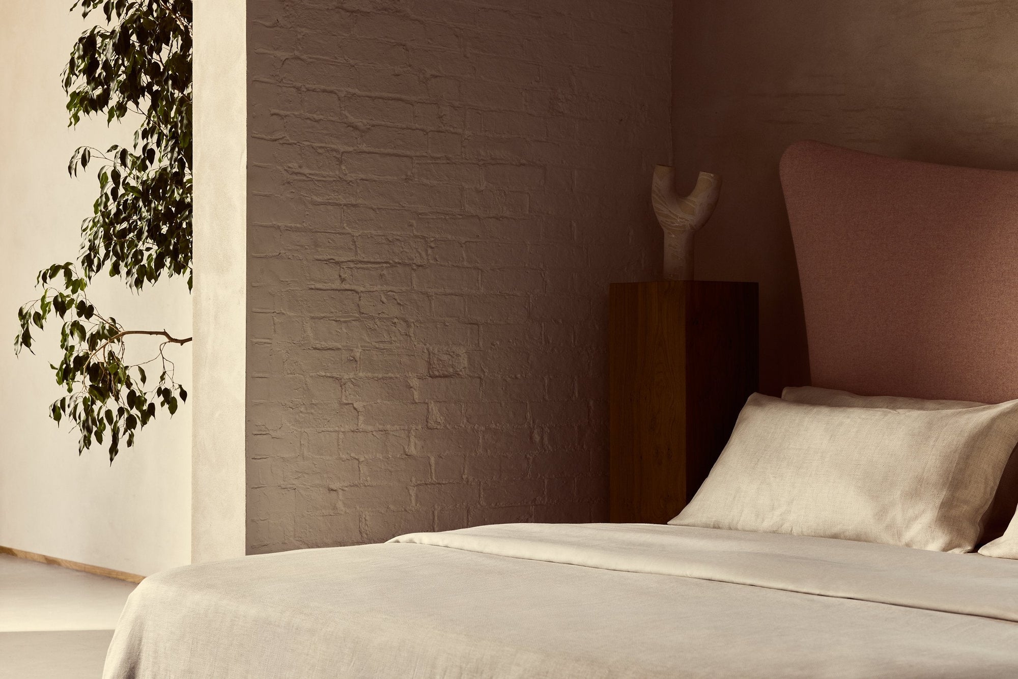 Savoir oatmeal Herringbone bed linen photographed on the Amelia bed.