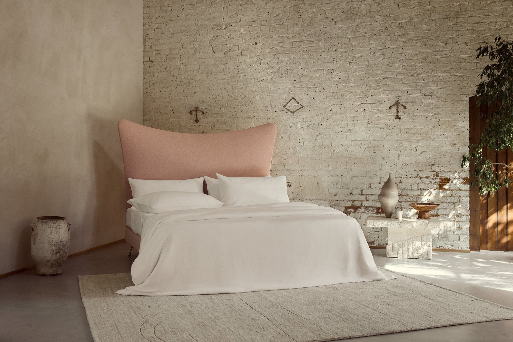 Amelia bed dressed in Savoir white pure Organic Linen bedding