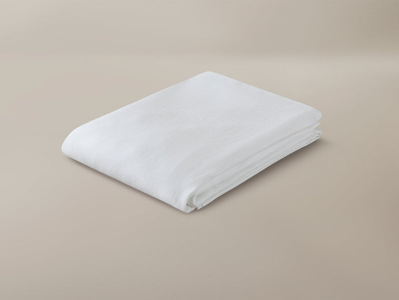 Folded Savoir organic linen fitted sheet