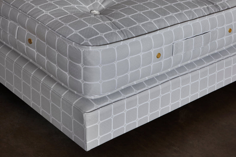 corner view of savoir vegan mattress and base