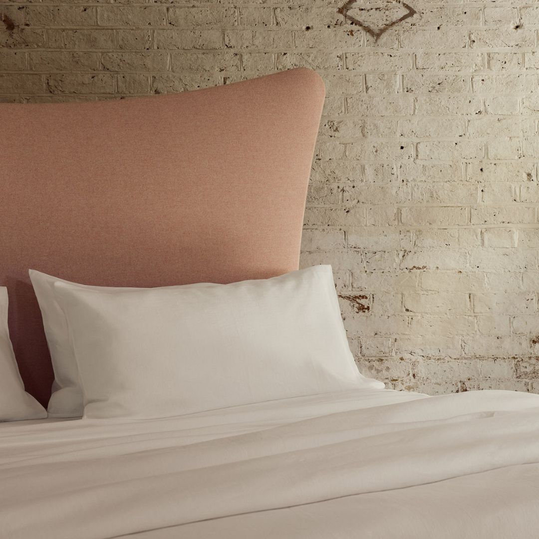 Pure organic linen pillowcases on a Savoir bed