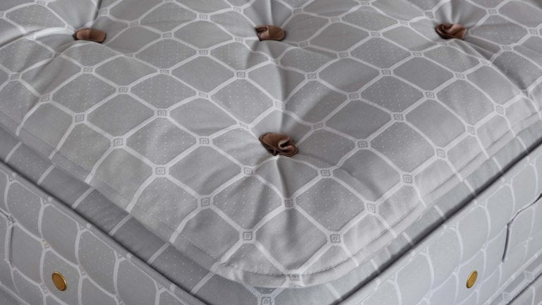Closeup of the Savoir no4 vegan topper and mattress