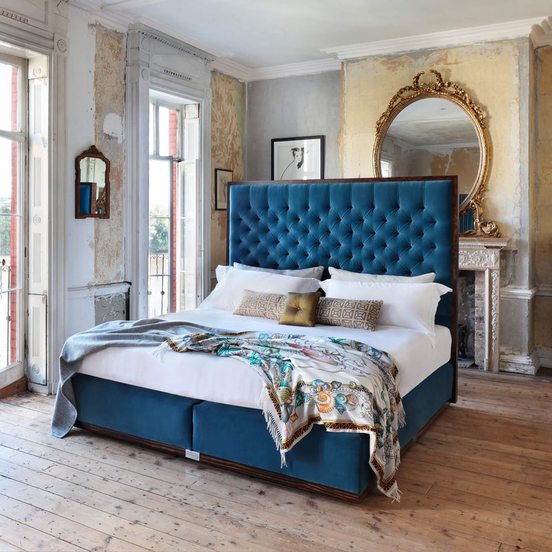 Savoir State No1 bed completely dressed and set in a room