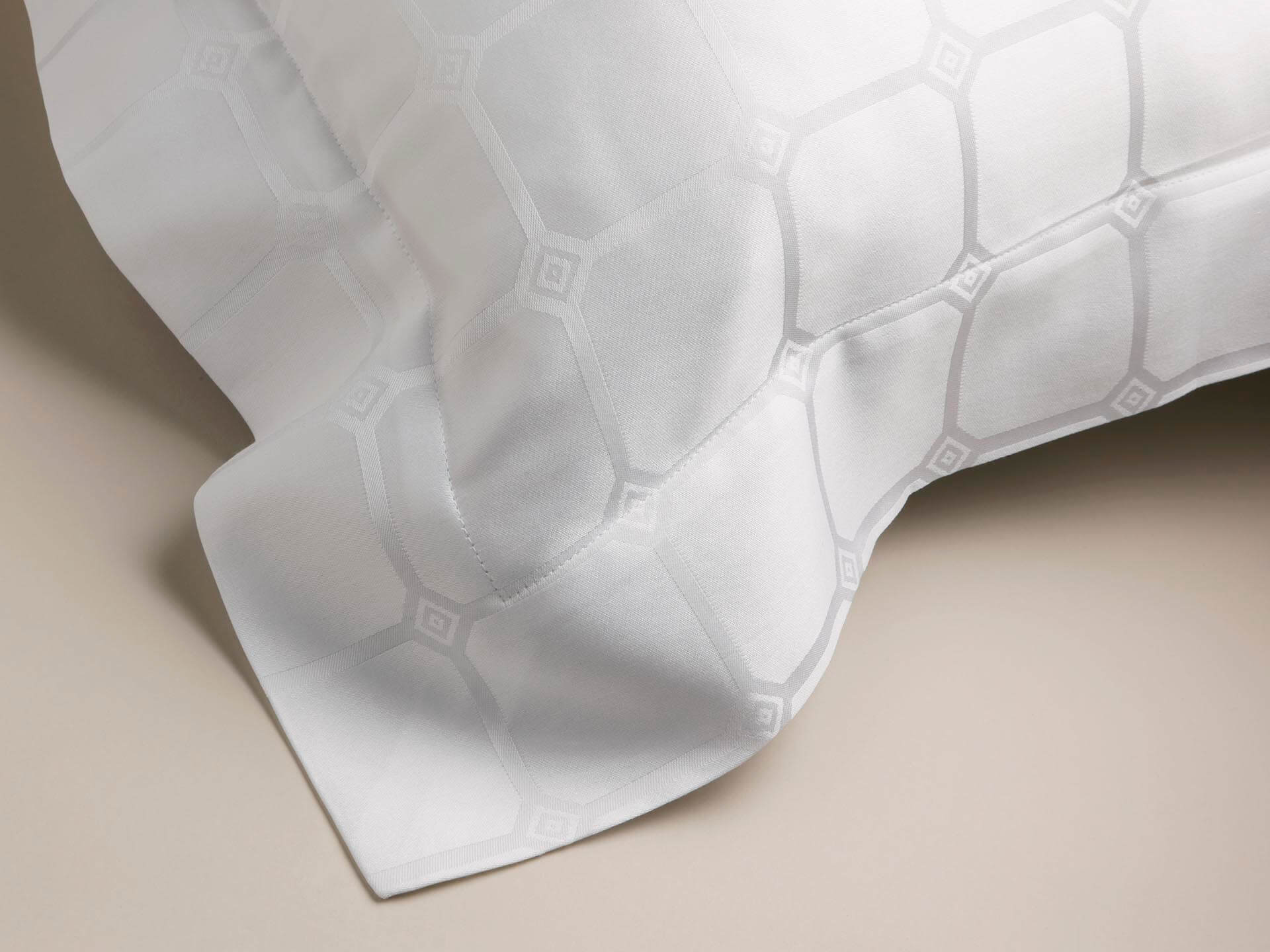 Angled view of an Oxford pillowcase with Trellis detail