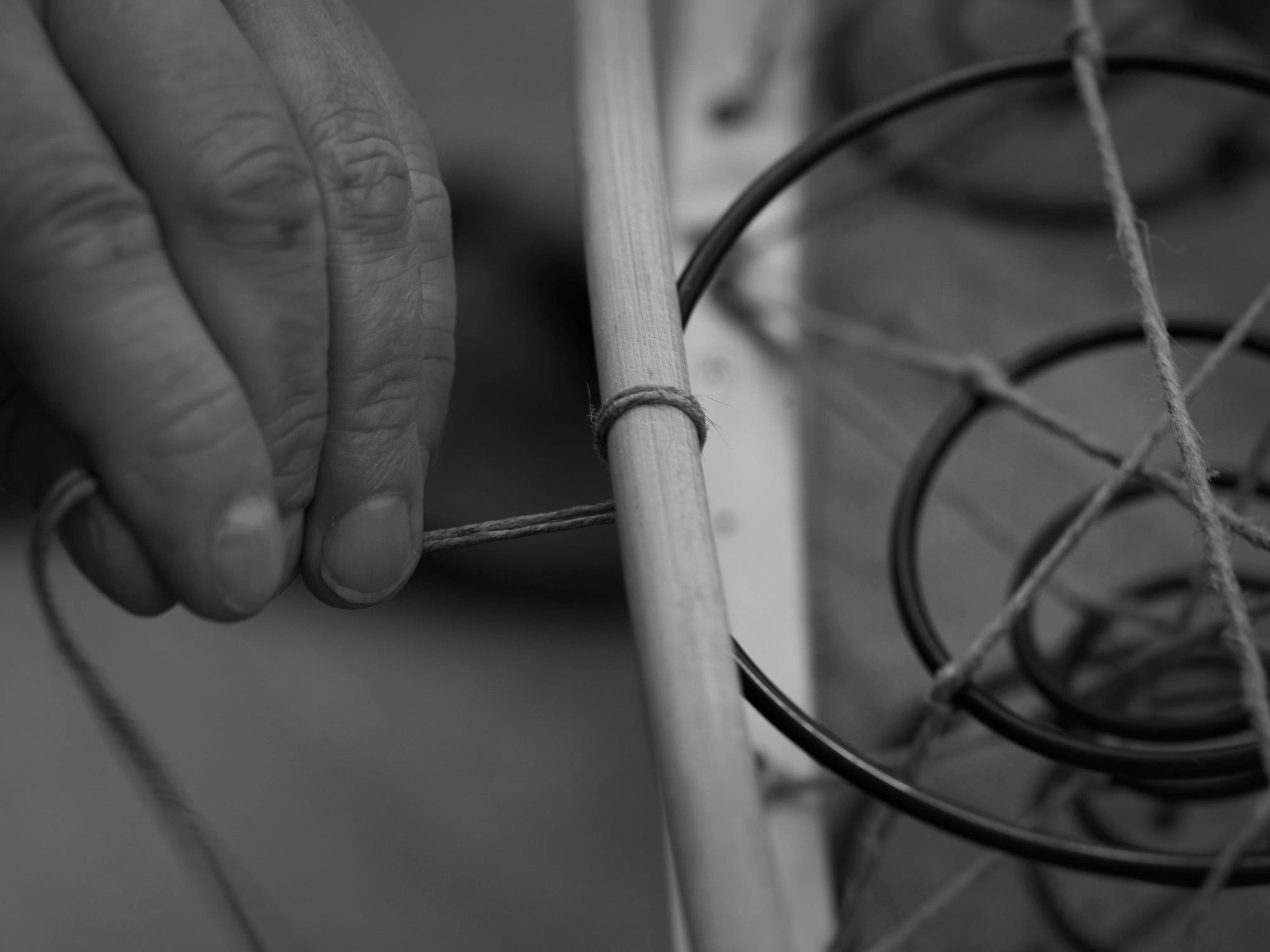 A rope being attached to a spring