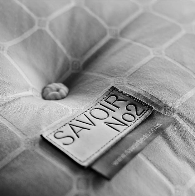 Black and white close-up of a Savoir No2 label